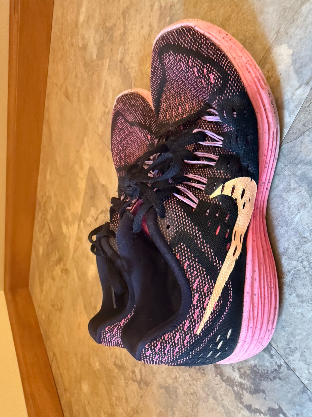 Nike Women's Black & Pink Running Shoes with Orange Swoosh Detail